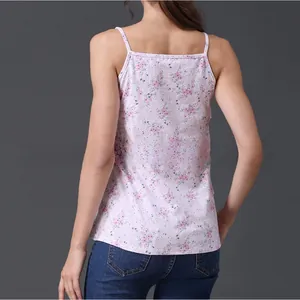 Detail of floral maternity nursing camisole with thin straps and ruffled layering style
