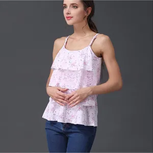 Detailed view of pink floral maternity camisole with tiered ruffles and soft modal texture