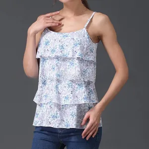 Detail view of the three-layer ruffle design and small floral pattern on the summer nursing top