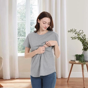 Detail of the hidden horizontal zipper nursing access on a grey cotton maternity t-shirt