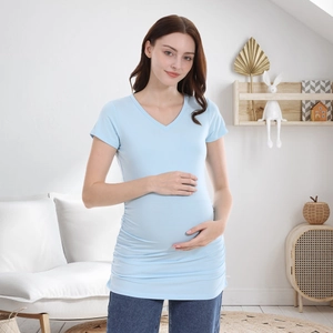 Detail view of light blue V-neck maternity T-shirt with side ruching for pregnancy
