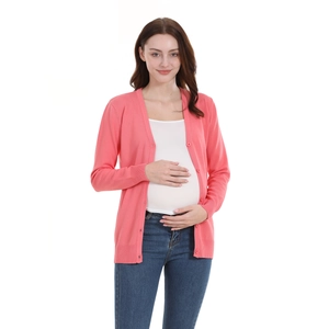 Pink maternity knit cardigan with V-neck buttons for autumn shown on pregnant model