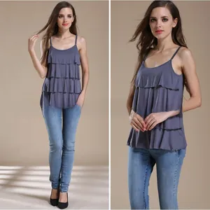 Detail of multi-layered ruffle hem on a smoke grey modal nursing camisole with tiered design