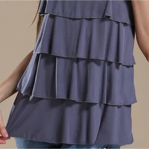 Detail of layered ruffle tiers on soft modal nursing tank top with fine edge stitching