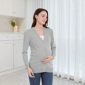 Macro detail of a light grey V-neck maternity cardigan with four functional buttons