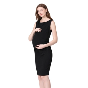 Detail of a black sleeveless maternity dress showing slim fit cut and soft cotton fabric