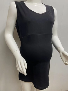 Detail of a black cotton nursing tank dress with a hidden horizontal nursing zipper