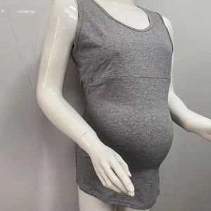 Side view of gray cotton maternity nursing tank top with round neck on model