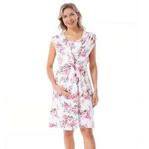 Detail of floral maternity dress showing front knot design and soft cotton flower fabric