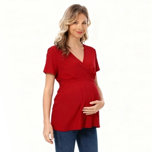 Detail of red V-neck maternity T-shirt with cross wrap front and pleated empire waistline