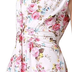 Detail of floral maternity dress with pink rose pattern and pleated waist design