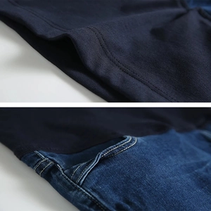 Dettaglio dei jeans premaman con fascia elastica in vita e cuciture rinforzate