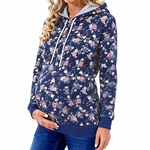 Close-up of maternity floral hoodie featuring a drawstring hood and kangaroo pocket