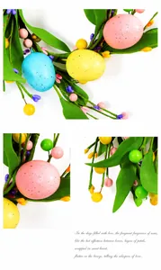 Detail view of colorful Easter eggs, purple berries and green leaves on decorative vine