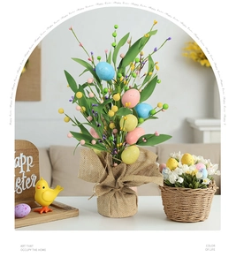 Easter floral arrangement with colorful foam eggs, burlap pot, and Happy Easter wood sign