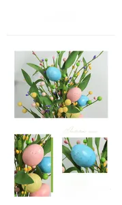 Detailed view of colorful Easter eggs with decorative berries and green leaf branches