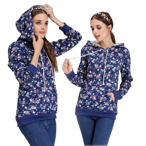 Detail of floral maternity nursing hoodie featuring a kangaroo pocket and white drawstrings