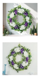 Detailed view of artificial eucalyptus wreath with violet flowers and white hydrangea decor