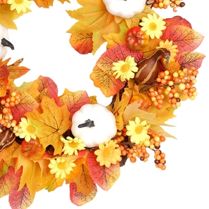 Autumn wreath with maple leaves and pumpkins for Thanksgiving home wall decoration