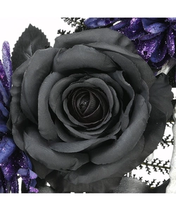Detailed close-up of handmade Gothic black rose wreath with purple sequins decoration