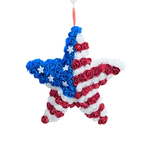 Star-shaped Fourth of July wreath with red white and blue roses for home decoration