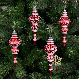 Set of four red spiral-patterned Christmas tree ornaments with silver glitter accents