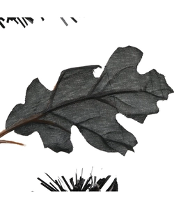 Close-up of black mesh artificial leaf with intricate net texture for Halloween decor