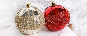 Detail of red and champagne Christmas balls with sequins and beadwork embroidery
