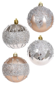 Detailed close-up of champagne and silver Christmas baubles with sequins and beads