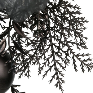 Gothic black Halloween wreath with dark foliage and mesh for spooky party door decoration
