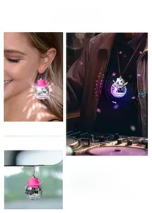 Disco ball accessories with pink cowboy hats and cow print patterns for party decor