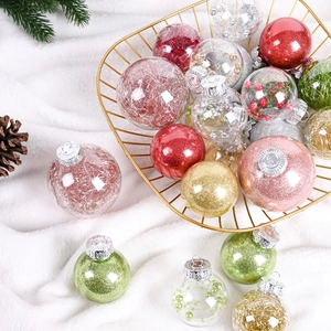 Multi-colored PET Christmas balls set with glitter and tinsel in a festive gold basket