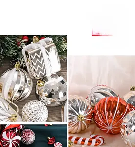 Detail of red and gold plated Christmas balls with glitter gift box and candy ornaments