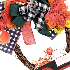 Autumn harvest festive wreath with colorful ribbons, maple leaves, and Happy sign