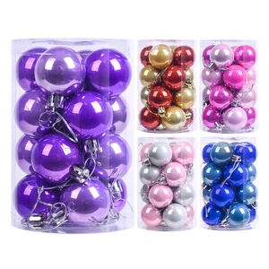 Glossy Christmas ball ornaments set in various colors displayed in clear cylindrical packaging