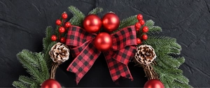 Close-up of 45cm Christmas wreath with red berries, pine cones and buffalo plaid bow