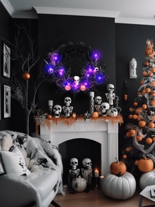 Detail of Halloween wreath with purple LED lights, skull accents and dark faux flowers