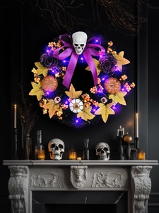 Detail of Halloween wreath with glowing purple LED lights and a white skull center