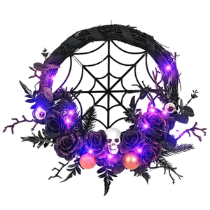 Halloween wreath with spider web, skulls, black roses and glowing purple LED lights