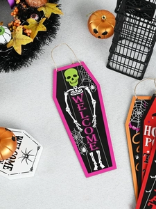 Detail of coffin-shaped Halloween wooden door hanger with skull and Welcome text