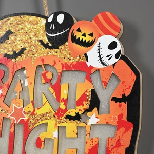 Detail of wooden Party Night Halloween sign with skull, pumpkin and bat patterns