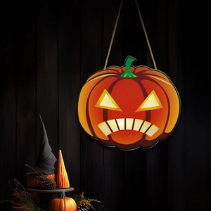 Halloween glowing pumpkin door sign made of wood with hemp rope hanging on a rustic wall