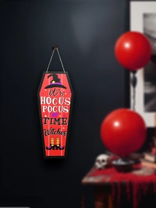 Detail of coffin-shaped wooden Halloween door hanger with witch and black cat illustrations