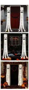 Detail of glowing Halloween ghost windsocks with LED lights for festive outdoor decoration