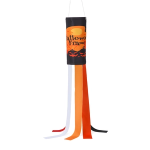 Detail of Halloween windsock with pumpkin prints and colorful hanging ribbons
