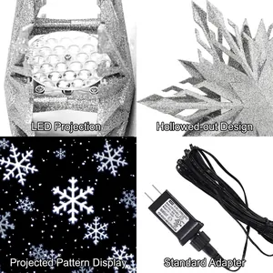 Silver glitter snowflake tree topper with integrated LED projector and power adapter