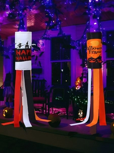 Outdoor Halloween windsock set with spooky castle and pumpkin designs for porch decoration