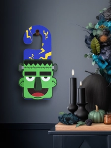 Halloween door hanger featuring Frankenstein monster design for party wall decoration