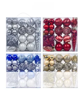 Detail of multi-colored textured Christmas ornaments in clear window box packaging