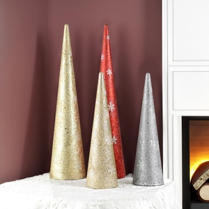 Detailed view of glittery cone Christmas ornaments with white snowflake patterns